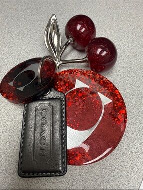 COACH Gunmetal Leather Tag with Red Glitter Cherry Keyring